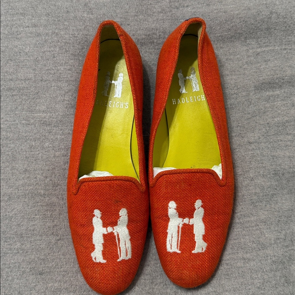 Hadleigh's Orange Loafers with White Silhouette Design
